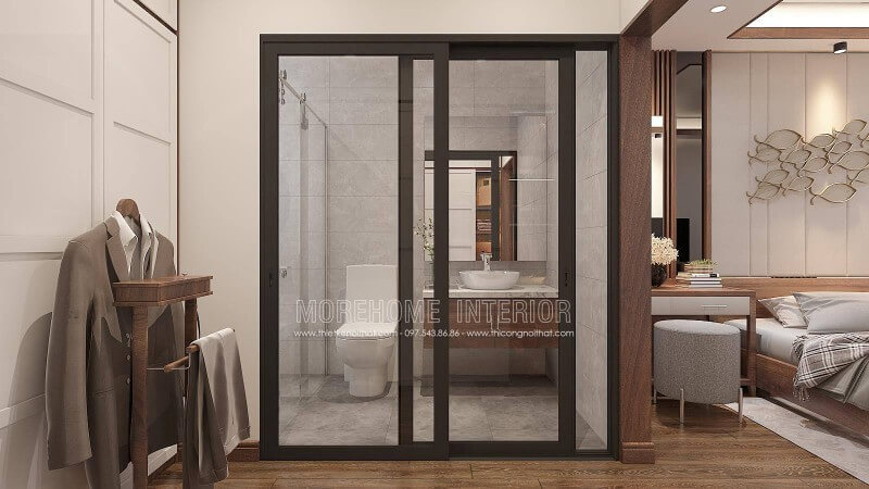 Mẫu trang trí nội thất phòng ngủ hiện đại khép kín trên đây sử dụng tone màu trầm ấn tượng với nội thất gỗ óc chó là một lựa chọn tuyệt vời cho không gian nhà phố, biệt thự. Thiết kế nội thất biệt thự