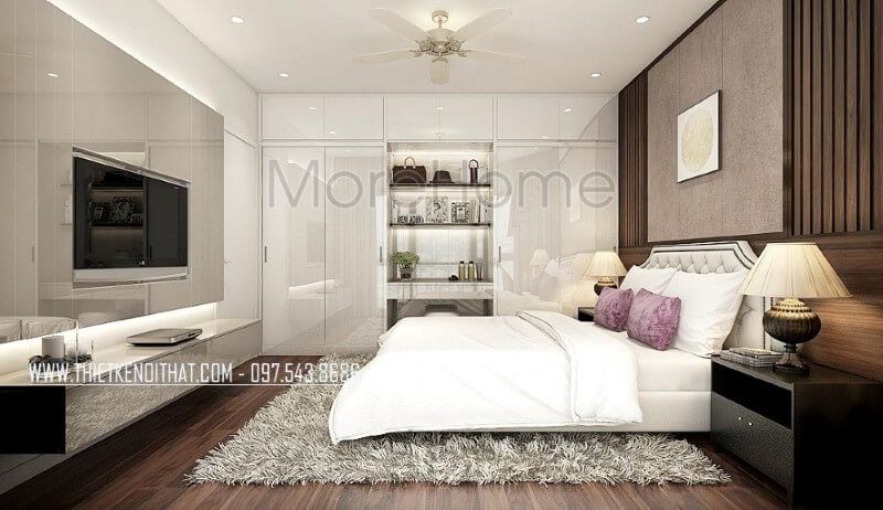 Tủ quần áo hiện đại vừa làm bàn trang điểm vừa để đồ trang trí vừa tận dụng không gian để quần áo với cửa 4 cánh cùng hệ tủ để đồ trên khá ngăn nắp giúp phòng ngủ trở nên gọn gàng, đẹp nhưng vẫn toát lên vẻ sang trọng, độc đáo.