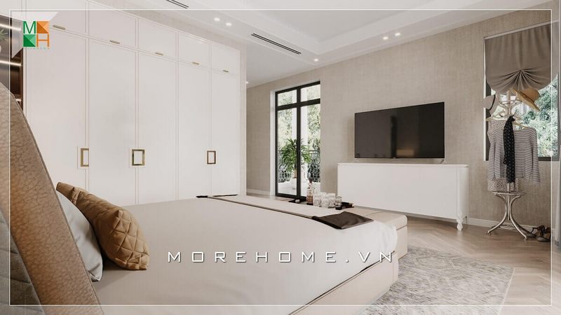 Mẫu thiết kế tủ quần áo bằng gỗ công nghiệp acrylic kịch tường, với tay cầm được mạ chi tiết màu vàng tạo cảm giác sang trọng